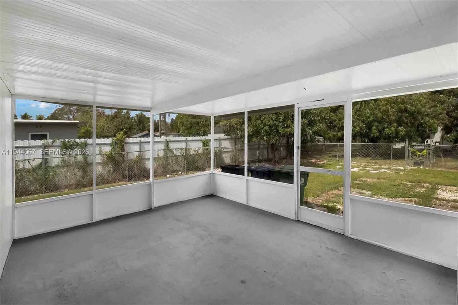 15351 Southwest 296th Street Homestead, FL 33033 - Photo 24 of 27 a view of a building with porch and outdoor space