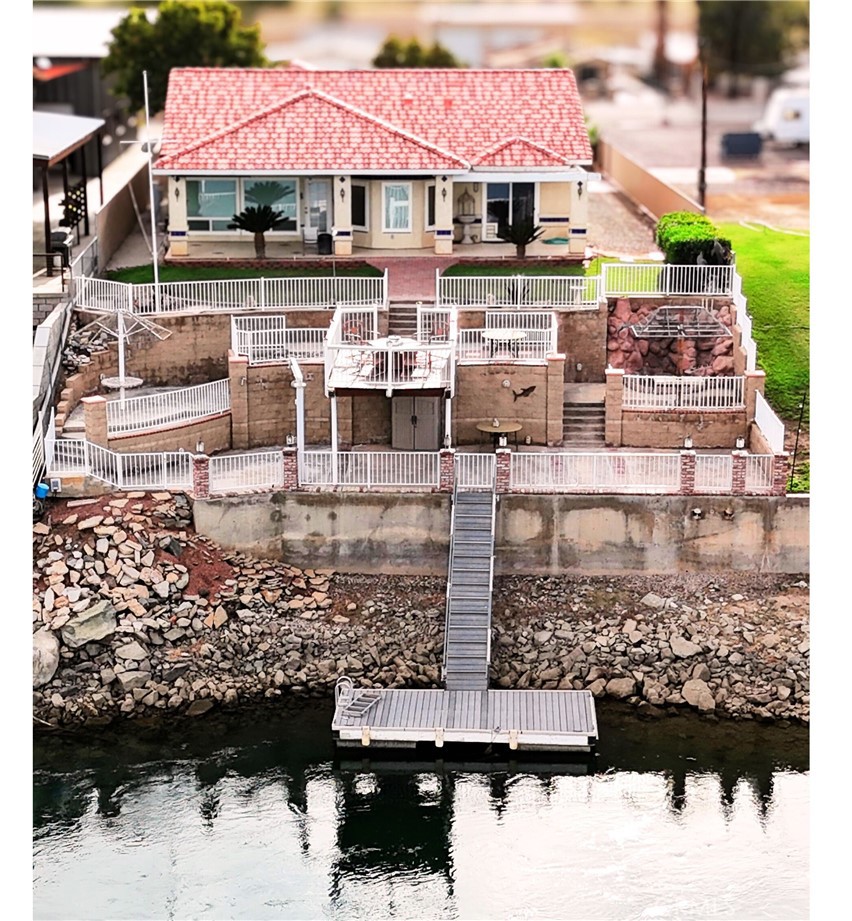 a view of swimming pool with outdoor seating
