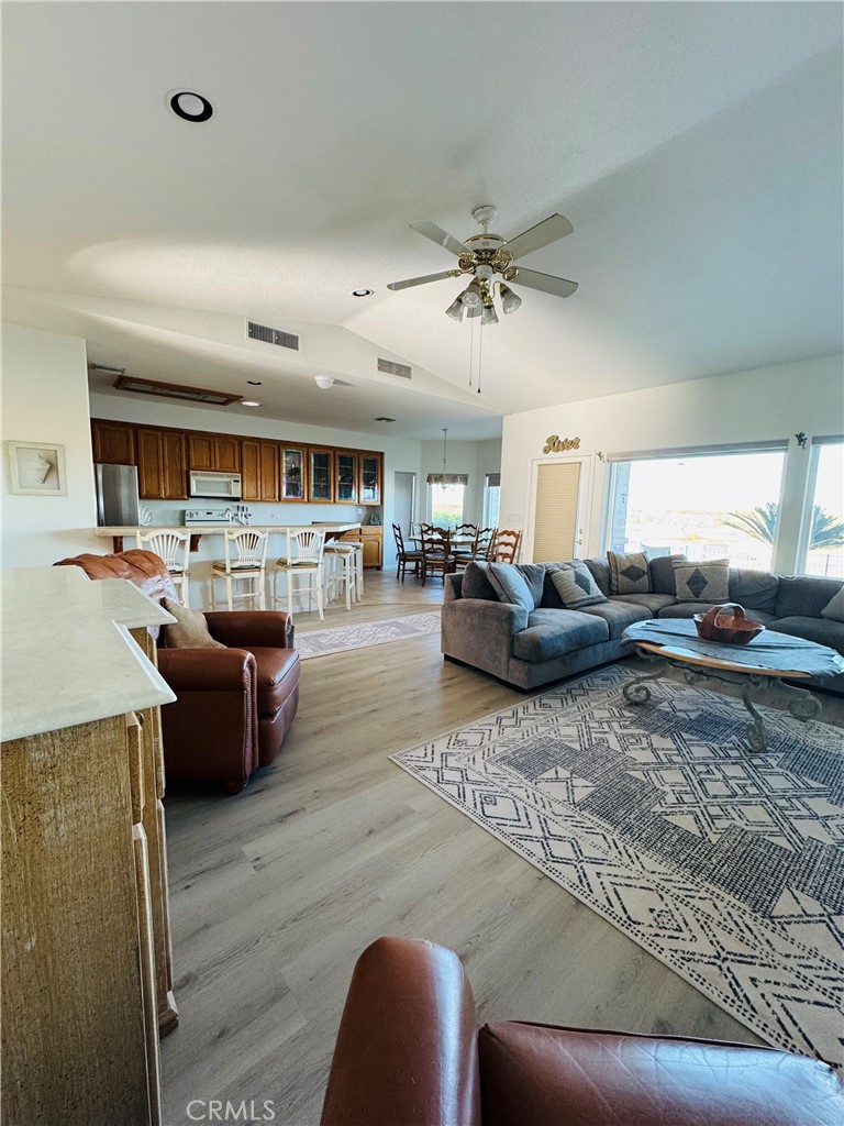 5770 Colorado River Road Blythe, CA 92225 - Photo 11 of 34 a living room with furniture kitchen view and a large window