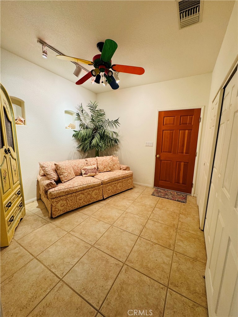5770 Colorado River Road Blythe, CA 92225 - Photo 17 of 34 a living room with a couch