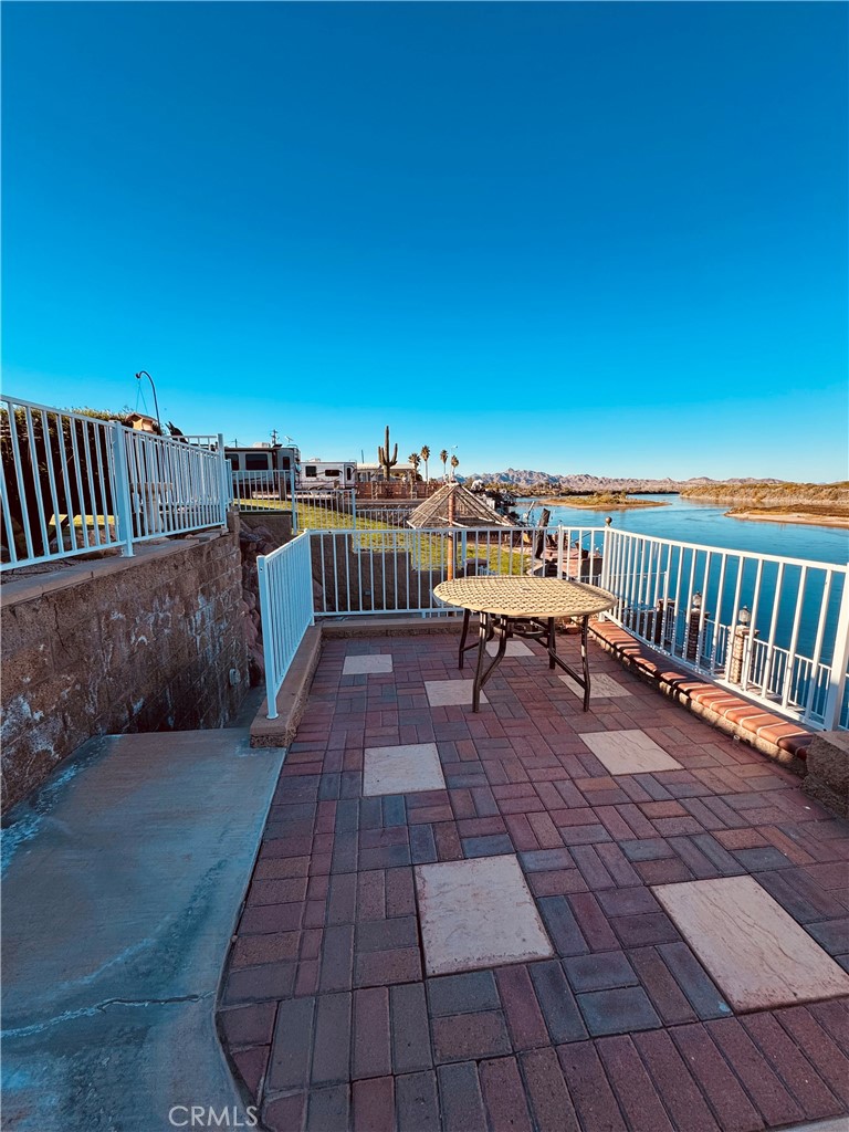 5770 Colorado River Road Blythe, CA 92225 - Photo 27 of 34 a balcony with furniture and a garden