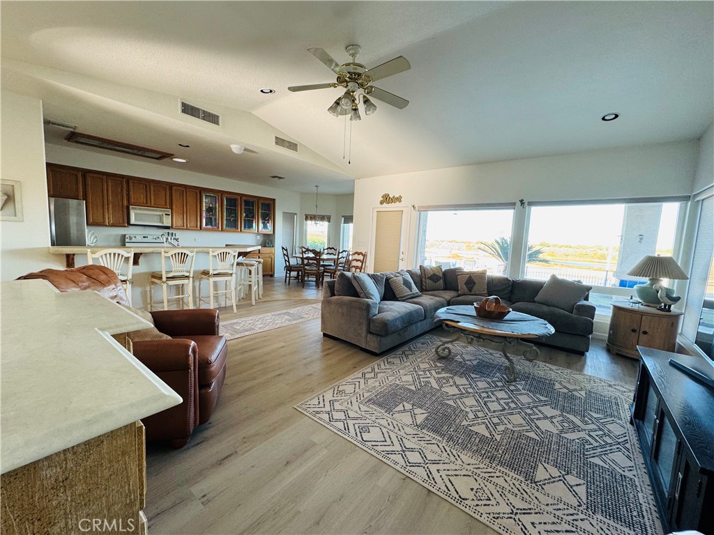 5770 Colorado River Road Blythe, CA 92225 - Photo 10 of 34 a living room with furniture kitchen view and a large window