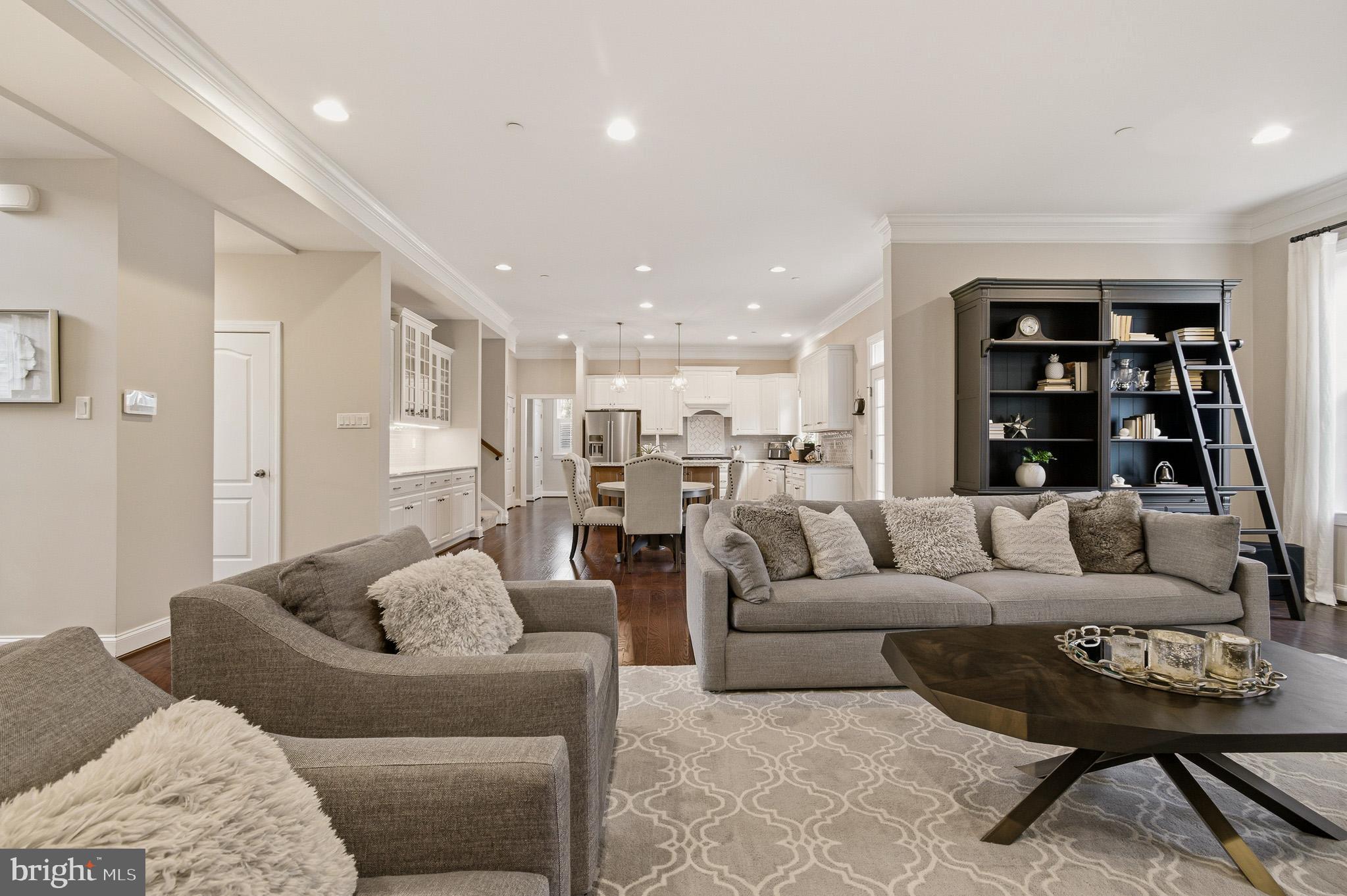 805 Lower Barn Way Olney, MD 20832 - Photo 16 of 77 a living room with furniture and a couch