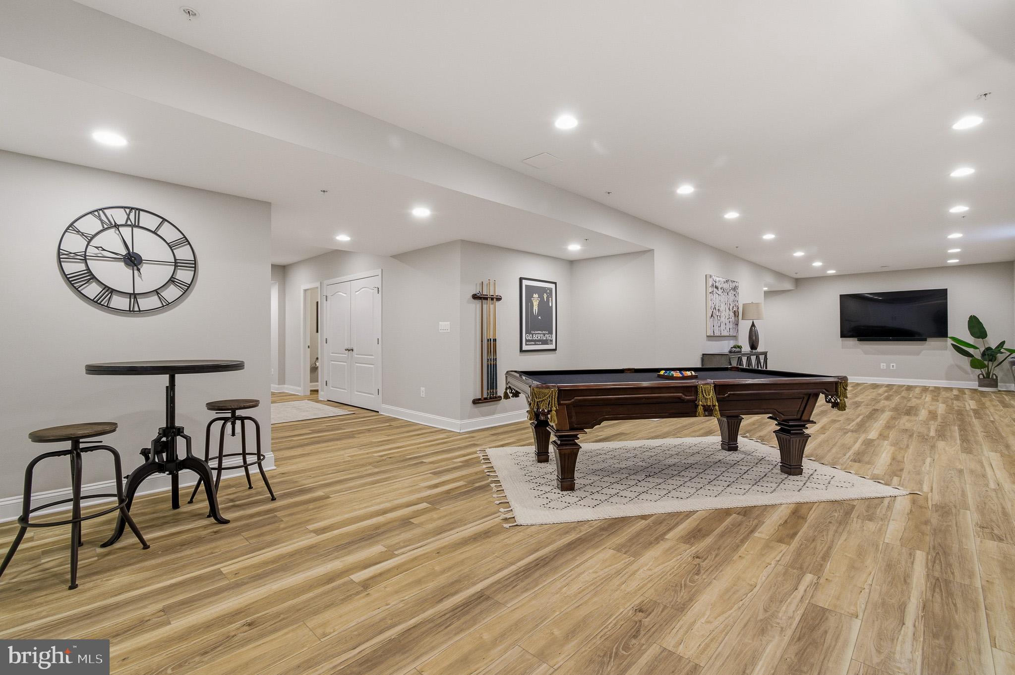 805 Lower Barn Way Olney, MD 20832 - Photo 32 of 77 a view of a room with furniture and wooden floor