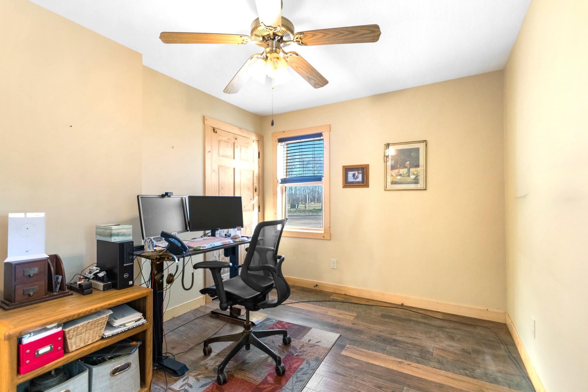 6014 Brown Road Kettle River, MN 55757 - Photo 23 of 54 Home office with dark wood-style flooring and a ceiling fan
