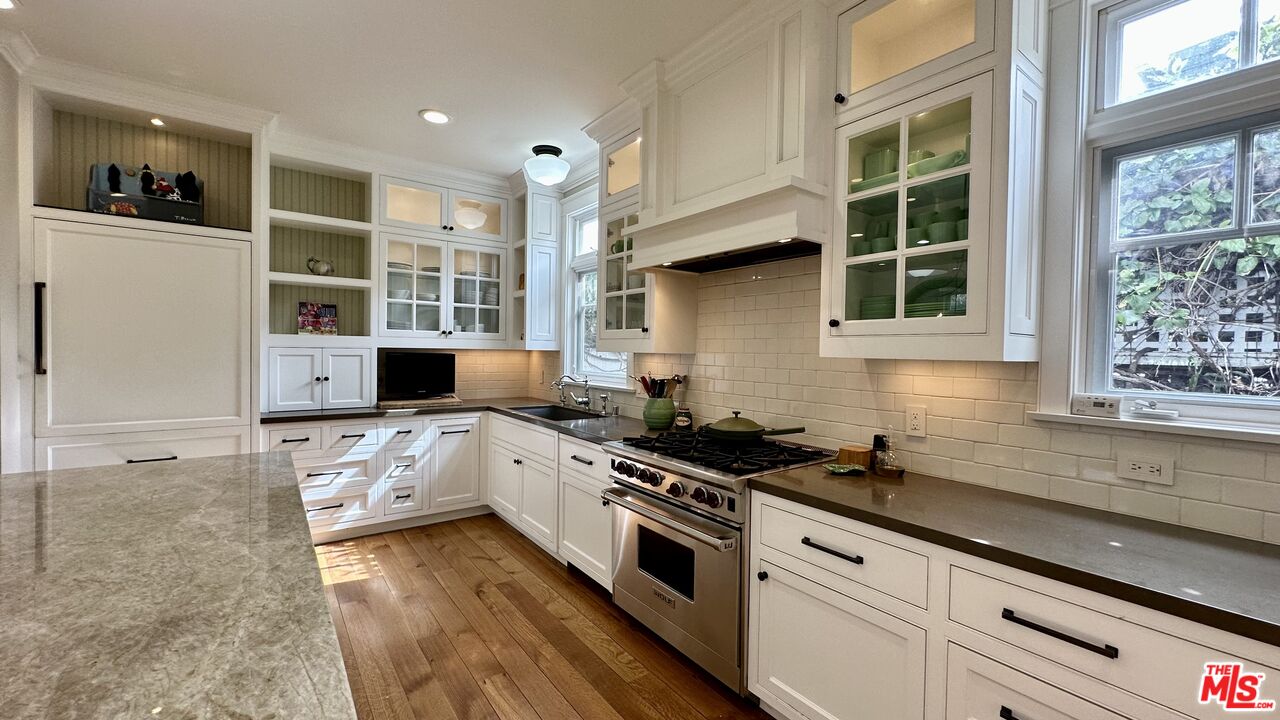 910 Marco Place Venice, CA 90291 - Photo 15 of 43 a kitchen with stainless steel appliances a stove a sink and a refrigerator