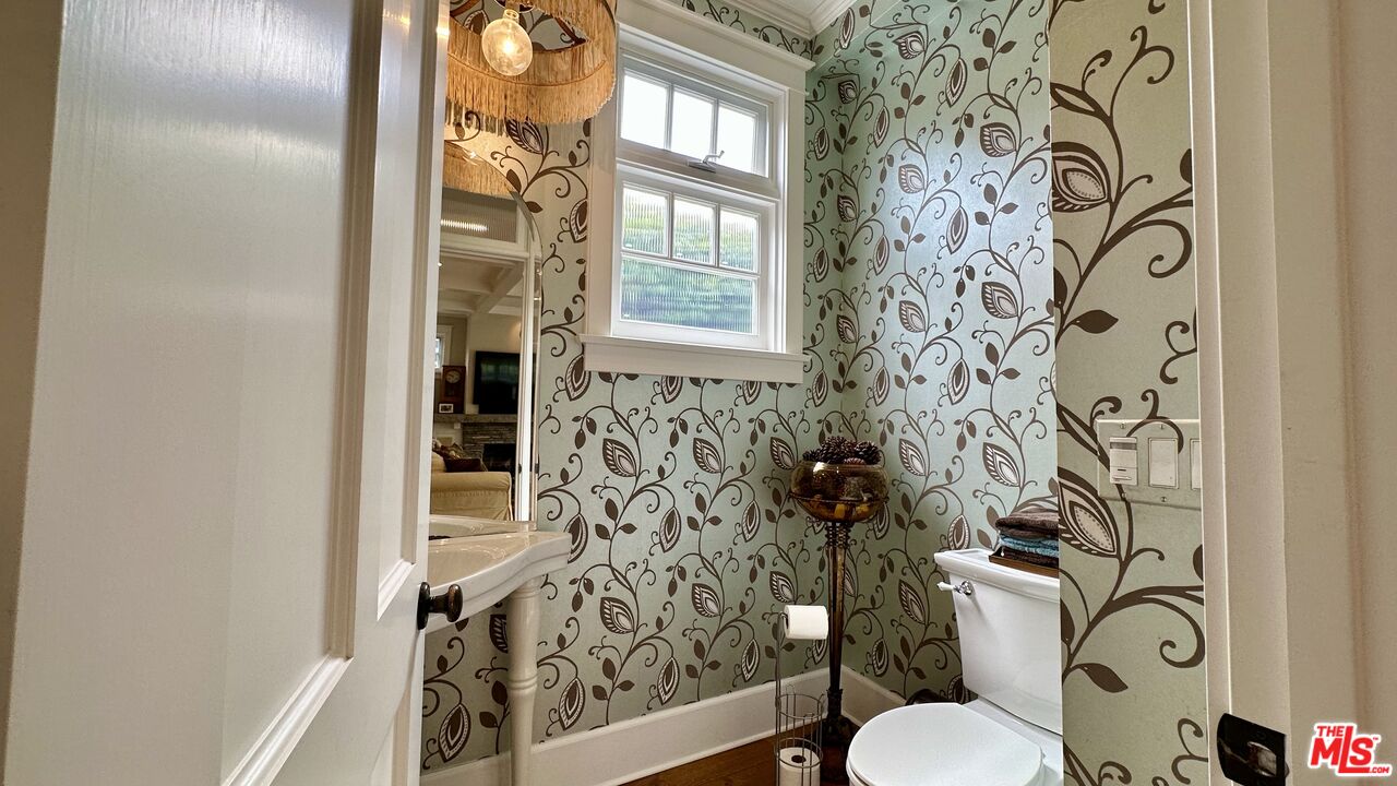 910 Marco Place Venice, CA 90291 - Photo 17 of 43 a bathroom with a toilet and a shower curtain