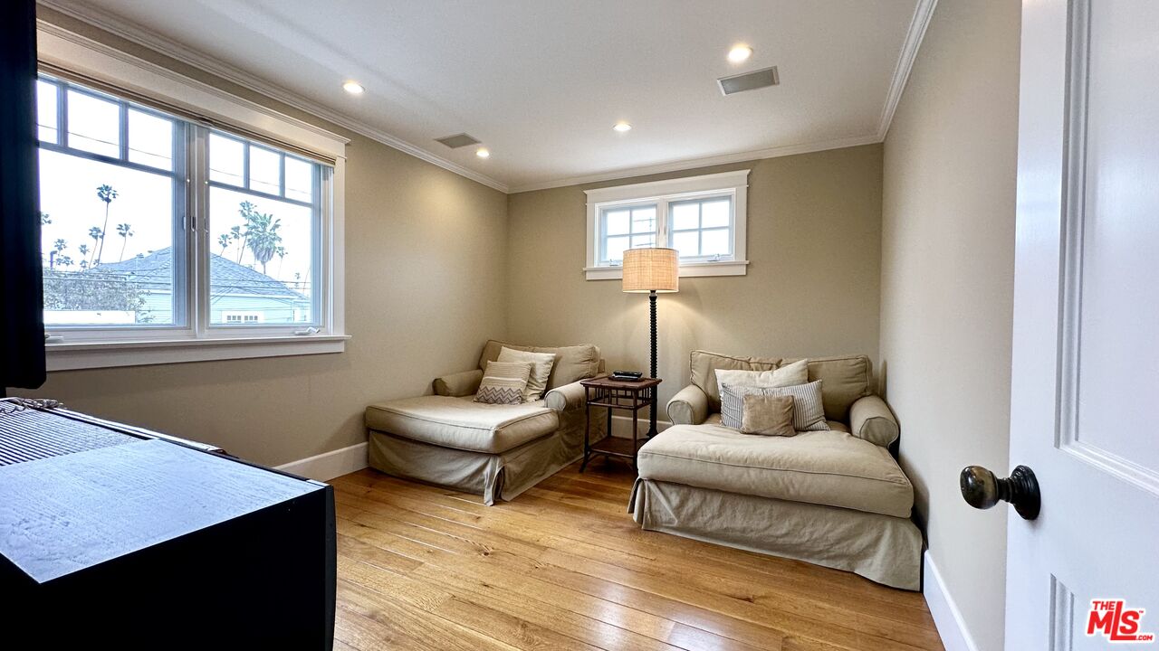910 Marco Place Venice, CA 90291 - Photo 34 of 43 a living room with furniture and a window