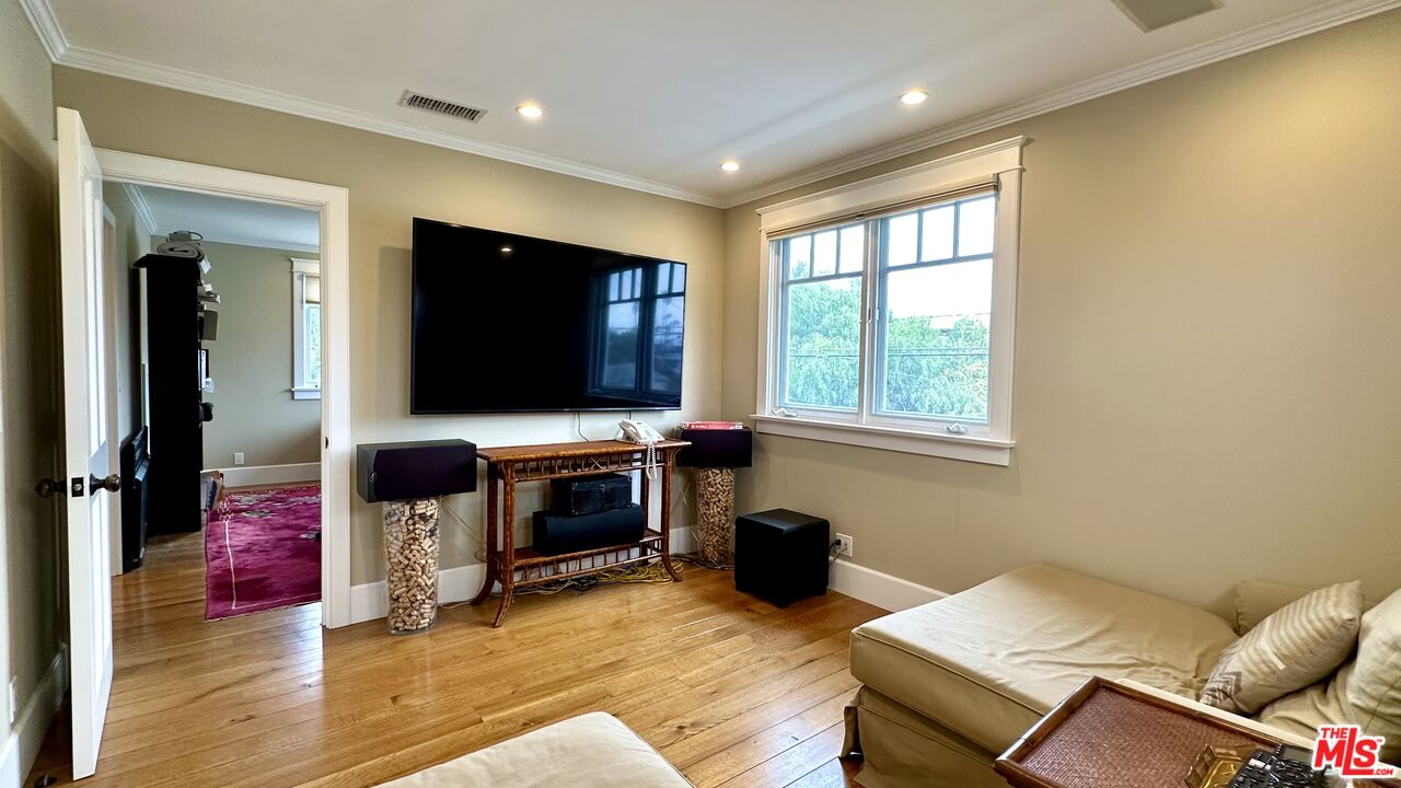 910 Marco Place Venice, CA 90291 - Photo 35 of 43 a living room with furniture and a flat screen tv