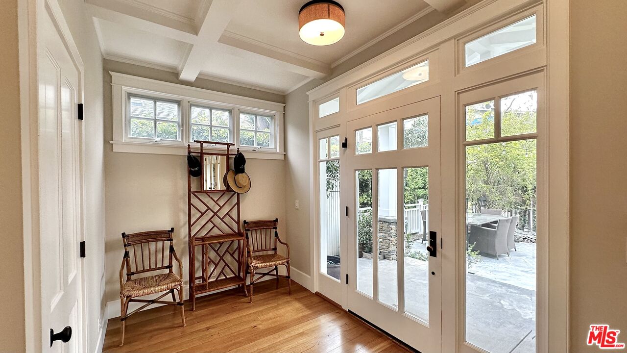 910 Marco Place Venice, CA 90291 - Photo 4 of 43 a view of an entryway with wooden floor and windows
