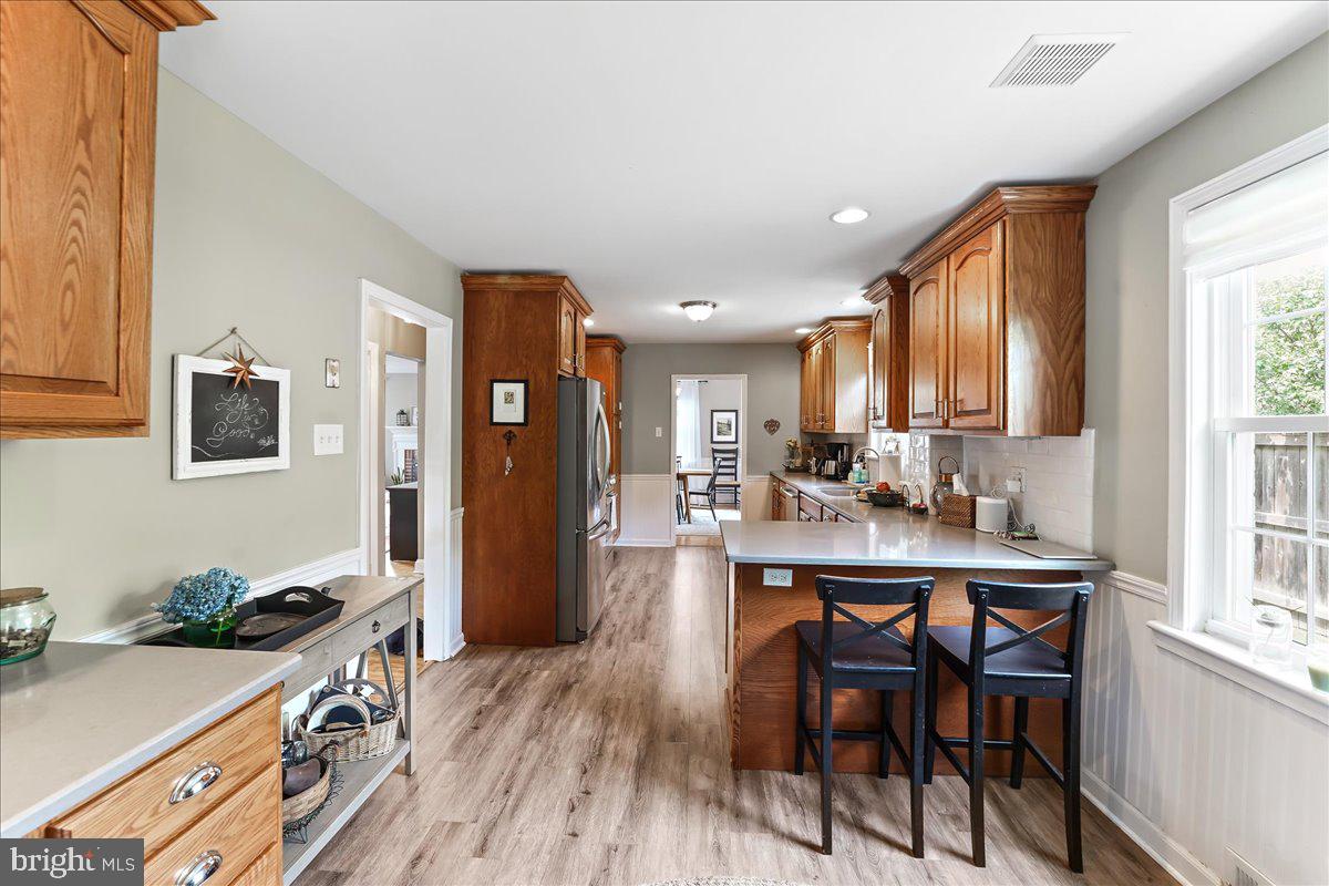 400 Southcroft Road Springfield, PA 19064 - Photo 16 of 44 a view of a dining room with furniture and wooden floor