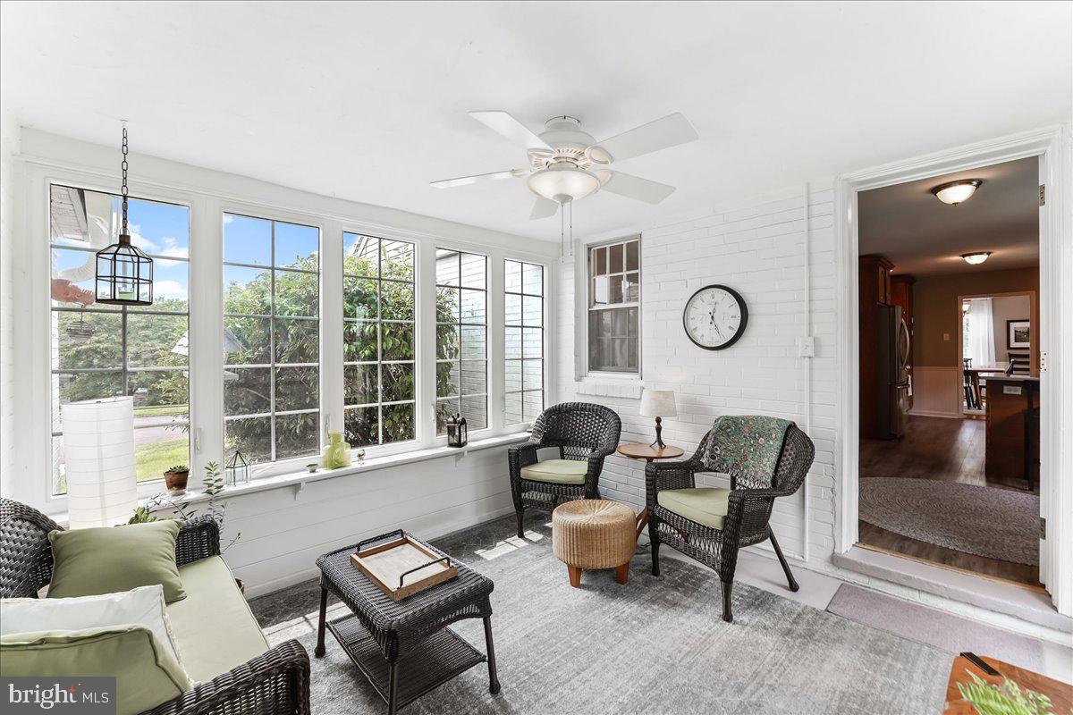 400 Southcroft Road Springfield, PA 19064 - Photo 18 of 44 a living room with furniture and a large window