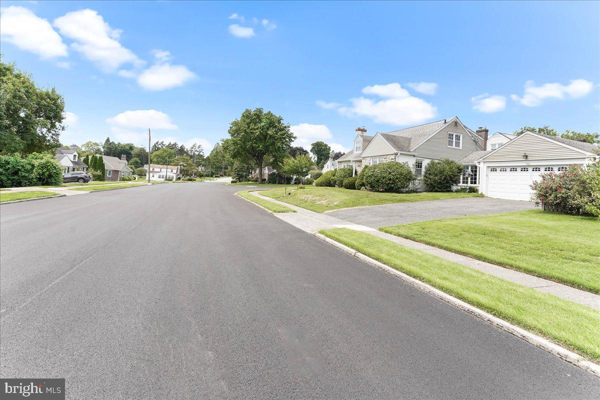 400 Southcroft Road Springfield, PA 19064 - Photo 44 of 44 a view of a house with a big yard and large trees