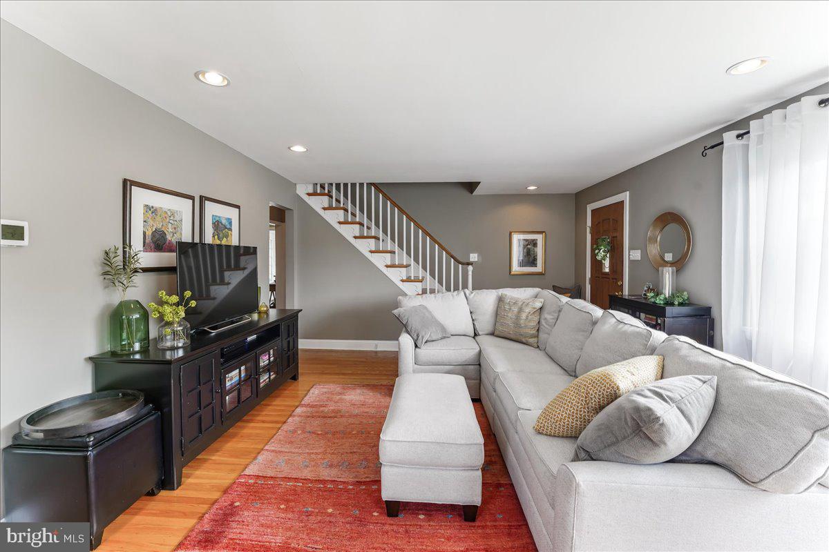 400 Southcroft Road Springfield, PA 19064 - Photo 7 of 44 a living room with furniture and a flat screen tv