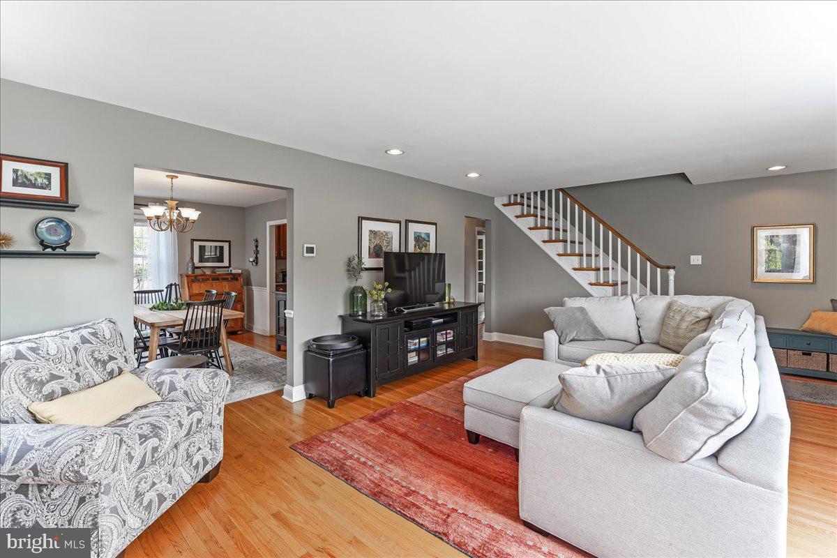 400 Southcroft Road Springfield, PA 19064 - Photo 8 of 44 a living room with furniture and a wooden floor