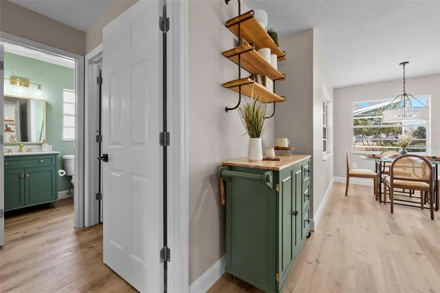 a view of a house with a yard and garage