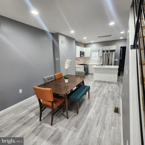 a large spacious bathroom with a large tub and sink