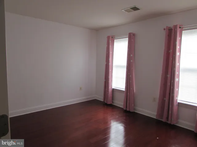a view of kitchen with wooden floor