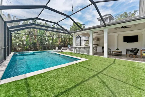 a view of a house with backyard