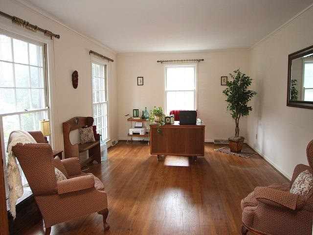 1104 Country Ridge Drive Raleigh, NC 27609 - Photo 5 of 24 Formal Living Room Features Hardwood Floors. This room would also make a great home office space. Living Room