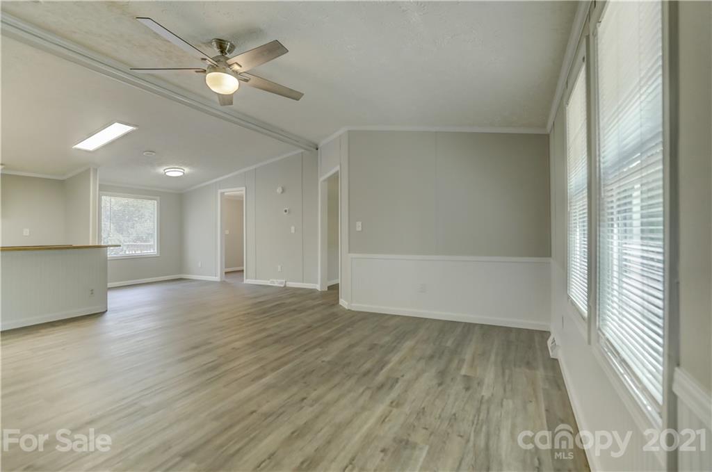 179 Davidson Road Clover, SC 29710 - Photo 16 of 31 wooden floor in an empty room with a window