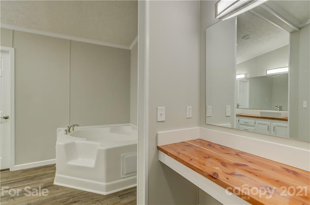 179 Davidson Road Clover, SC 29710 - Photo 19 of 31 a bathroom with a sink and a mirror