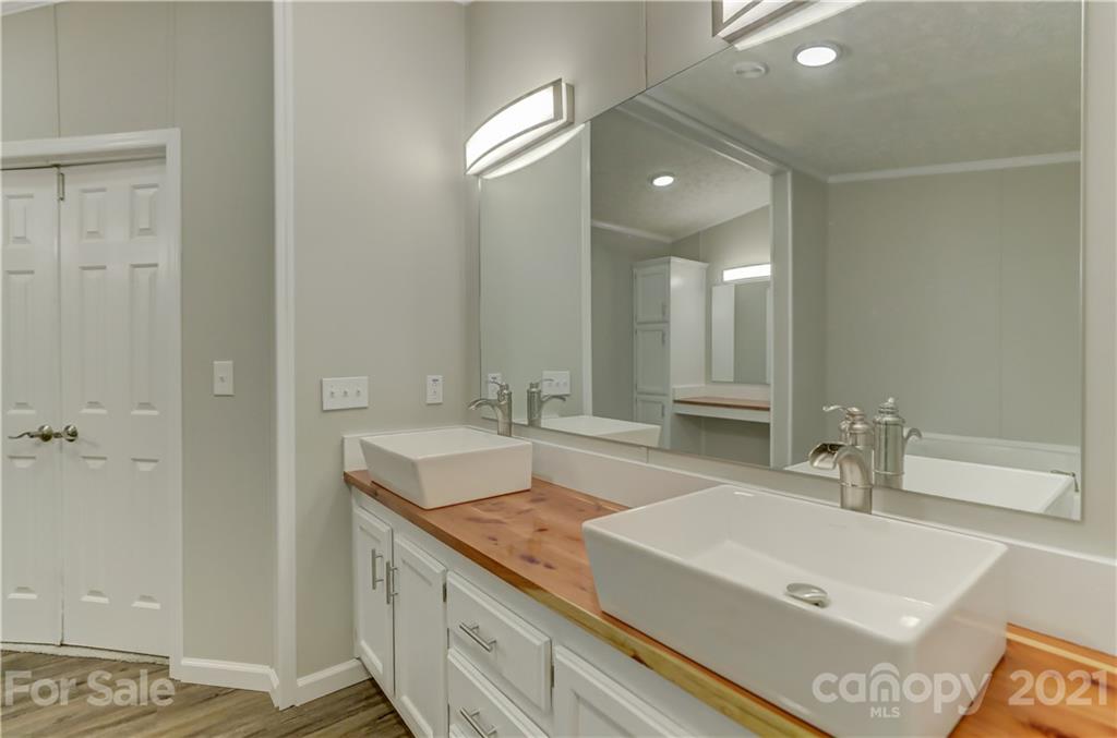 179 Davidson Road Clover, SC 29710 - Photo 20 of 31 a bathroom with a sink and a mirror