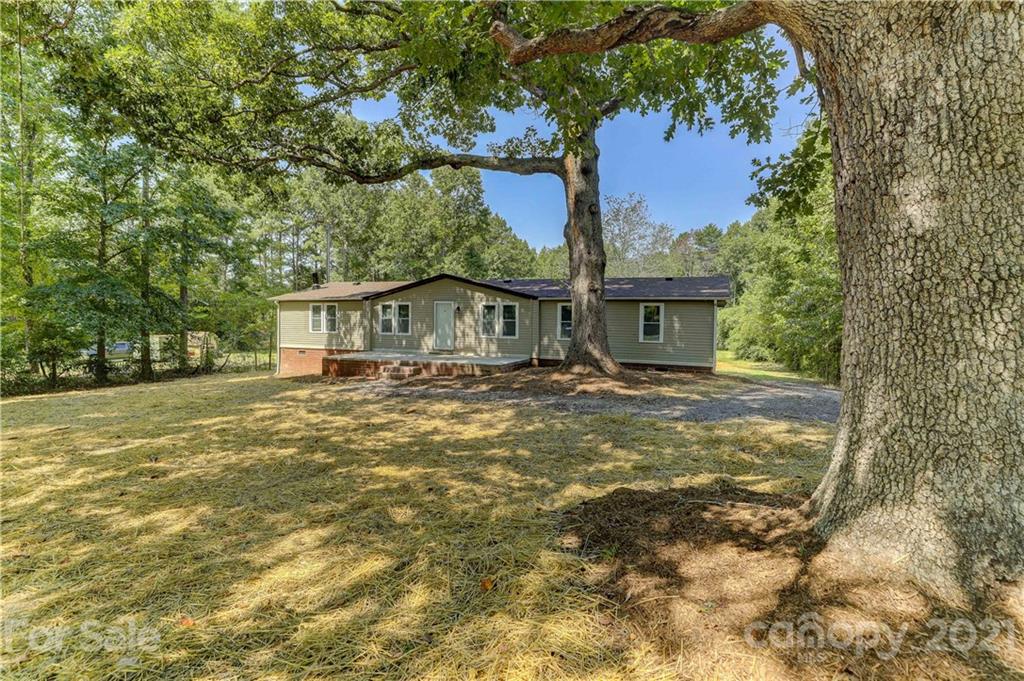 179 Davidson Road Clover, SC 29710 - Photo 3 of 31 a front view of a house with a yard
