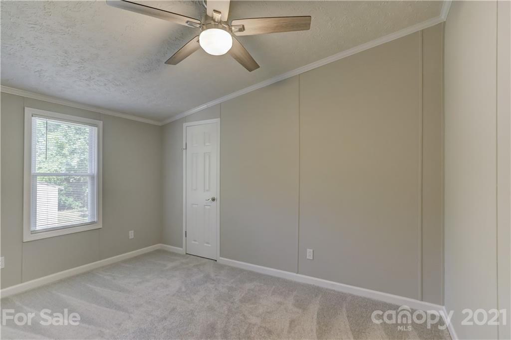 179 Davidson Road Clover, SC 29710 - Photo 21 of 31 a view of an empty room with a window