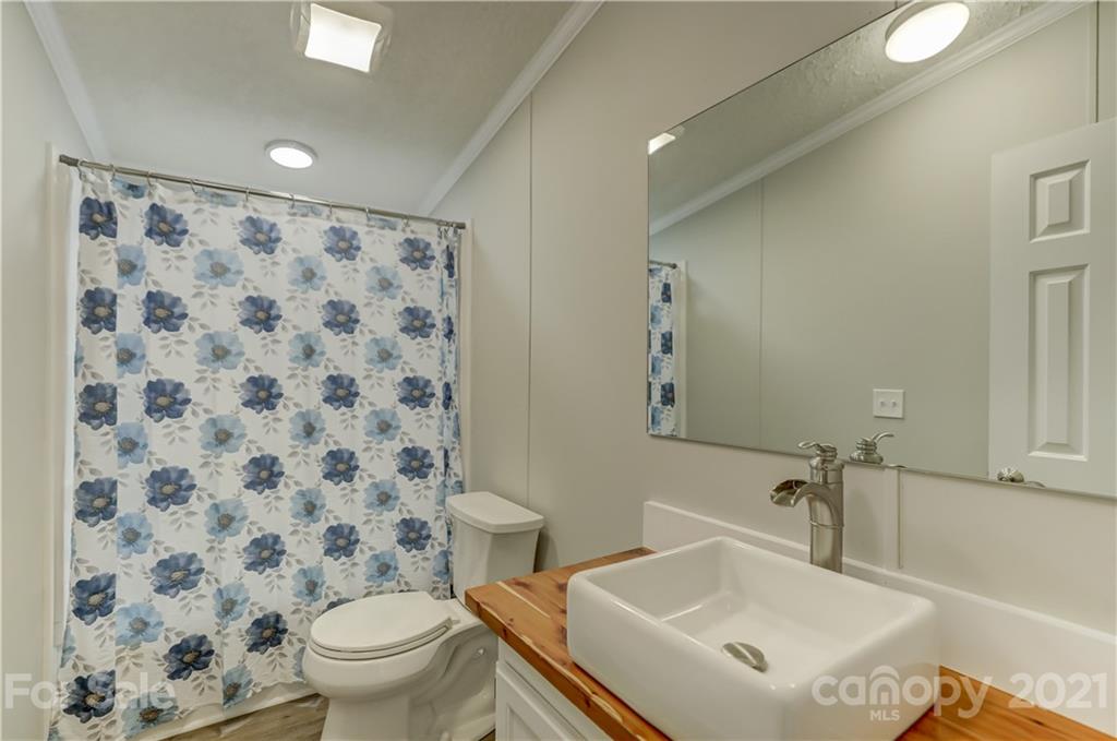 179 Davidson Road Clover, SC 29710 - Photo 22 of 31 a bathroom with a sink toilet and shower