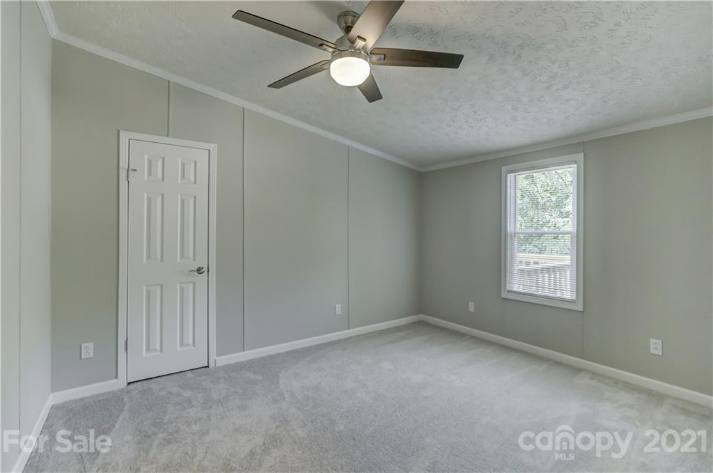 179 Davidson Road Clover, SC 29710 - Photo 23 of 31 a view of empty room with window and ceiling fan