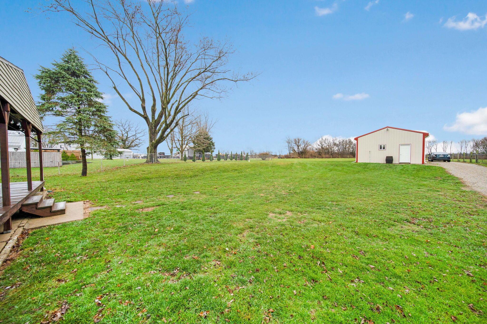 5243 Old Columbus Road Springfield, OH 45502 - Photo 16 of 19 Backyard and Outbuilding