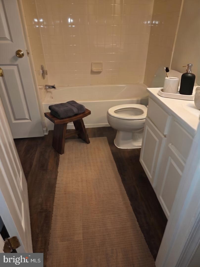 146 Danbury Street Southwest Washington, DC 20032 - Photo 17 of 40 a bathroom with a sink and toilet