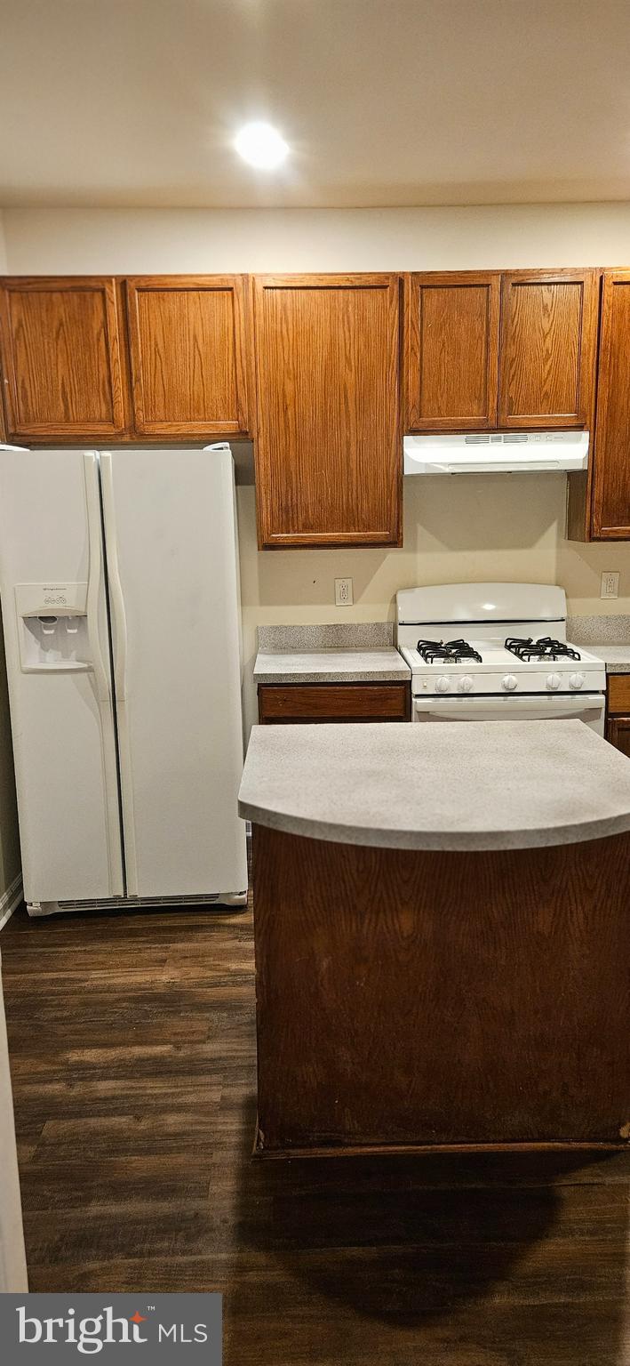 146 Danbury Street Southwest Washington, DC 20032 - Photo 36 of 40 a stove top oven sitting inside of a kitchen