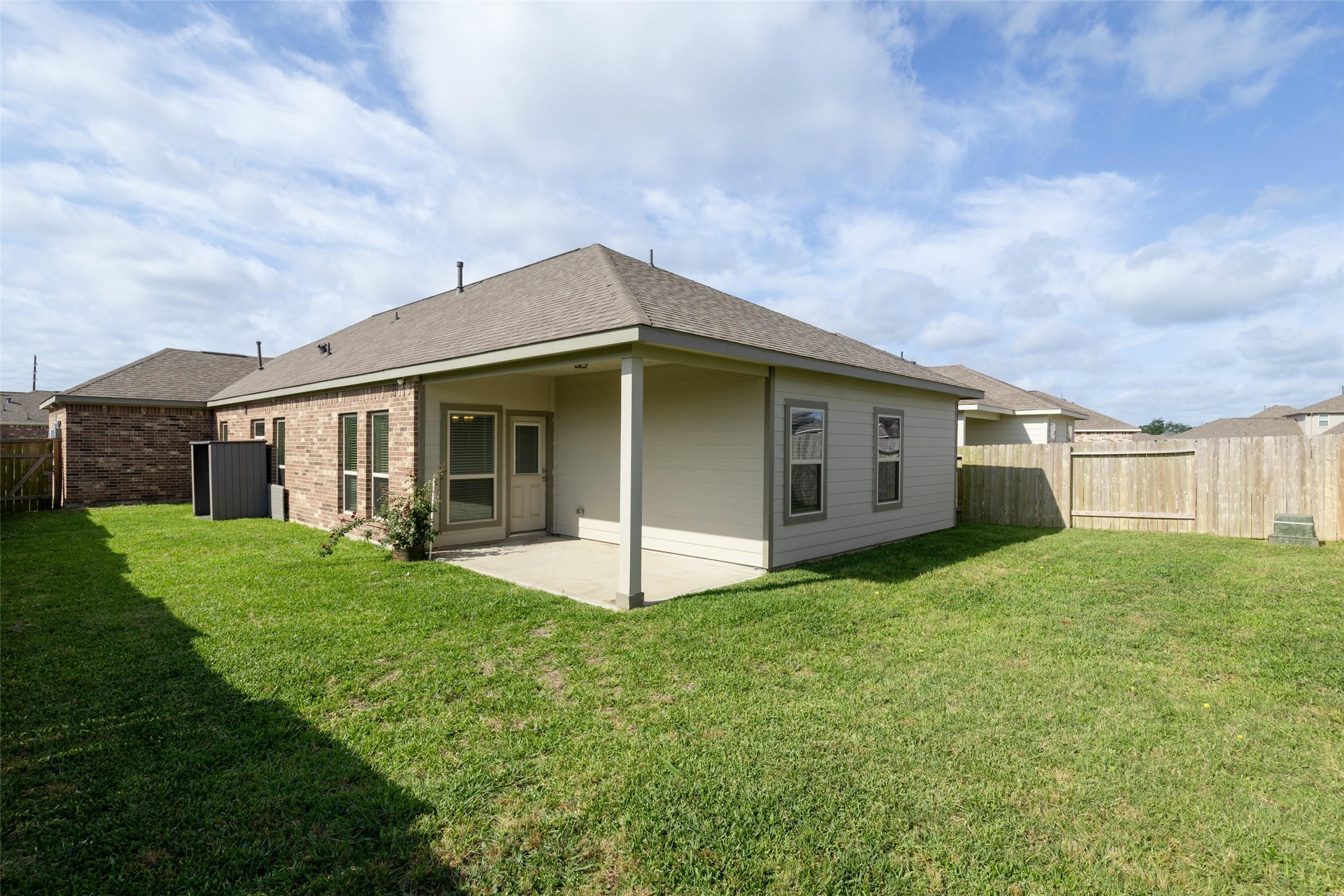 1333 Red Hills Drive Rosharon, TX 77583 - Photo 17 of 29 a view of a house with a yard and front view of a house
