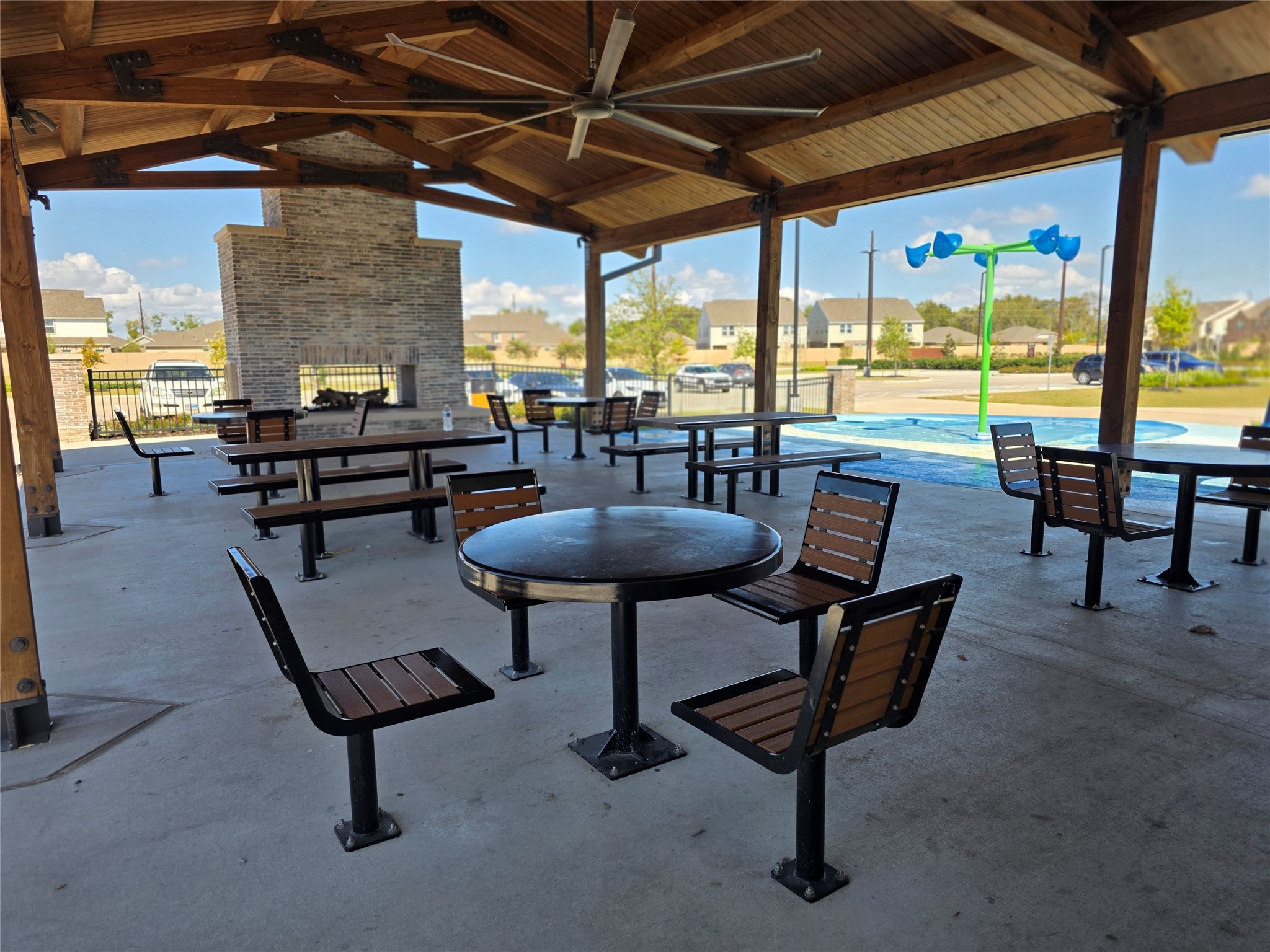 1333 Red Hills Drive Rosharon, TX 77583 - Photo 22 of 29 a living room with furniture and a floor to ceiling window