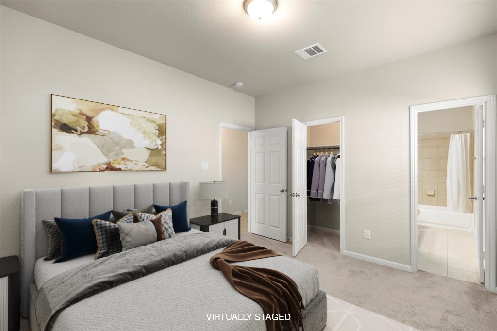 1333 Red Hills Drive Rosharon, TX 77583 - Photo 7 of 29 a bedroom with a bed and a painting on the wall