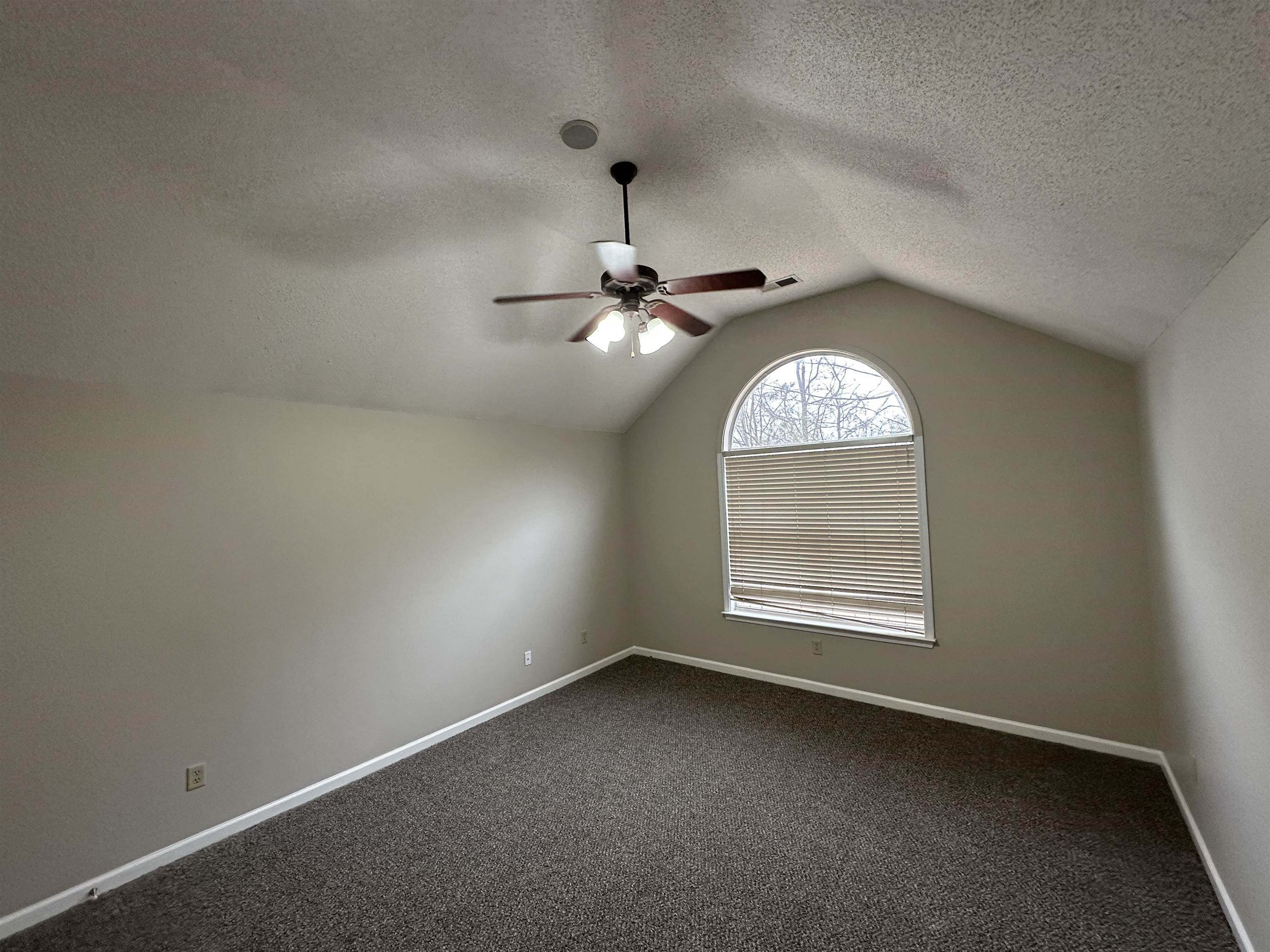 10144 Lynham Drive Cordova, TN 38016 - Photo 7 of 15 an empty room with a window