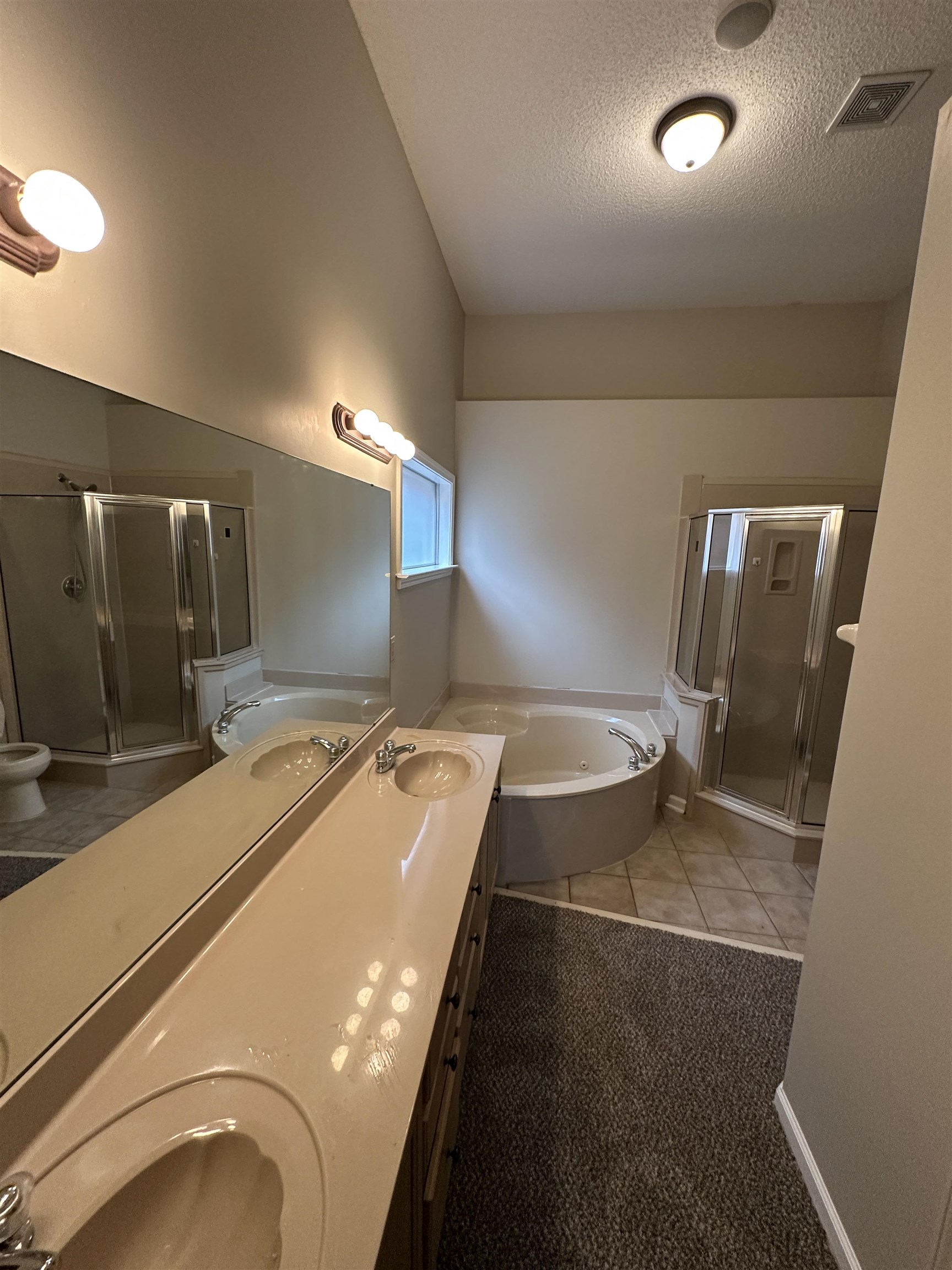 10144 Lynham Drive Cordova, TN 38016 - Photo 8 of 15 a room with gym equipment and a large window