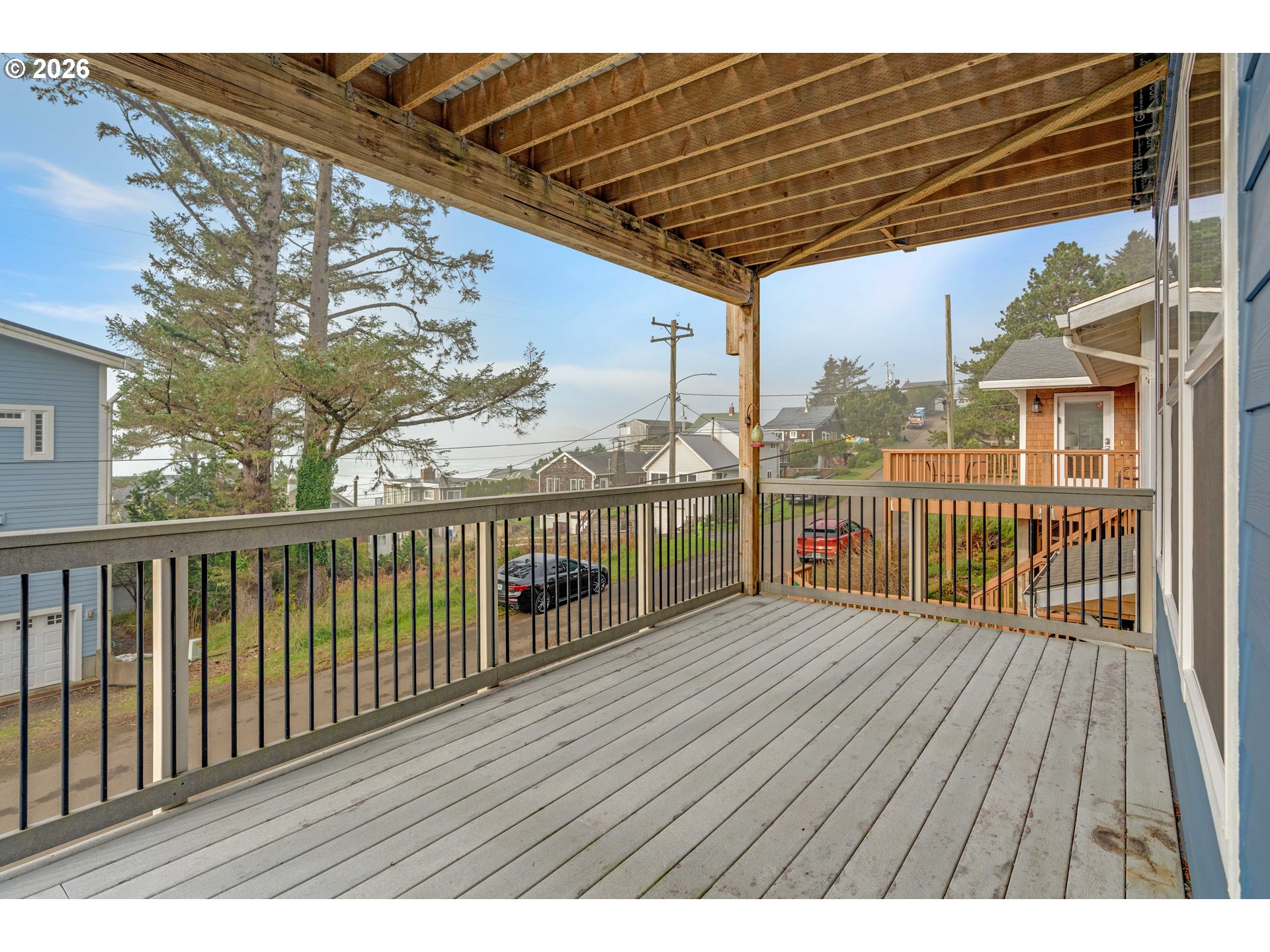 1435 Sunset Avenue Oceanside, OR 97141 - Photo 32 of 46 a view of balcony with wooden floor