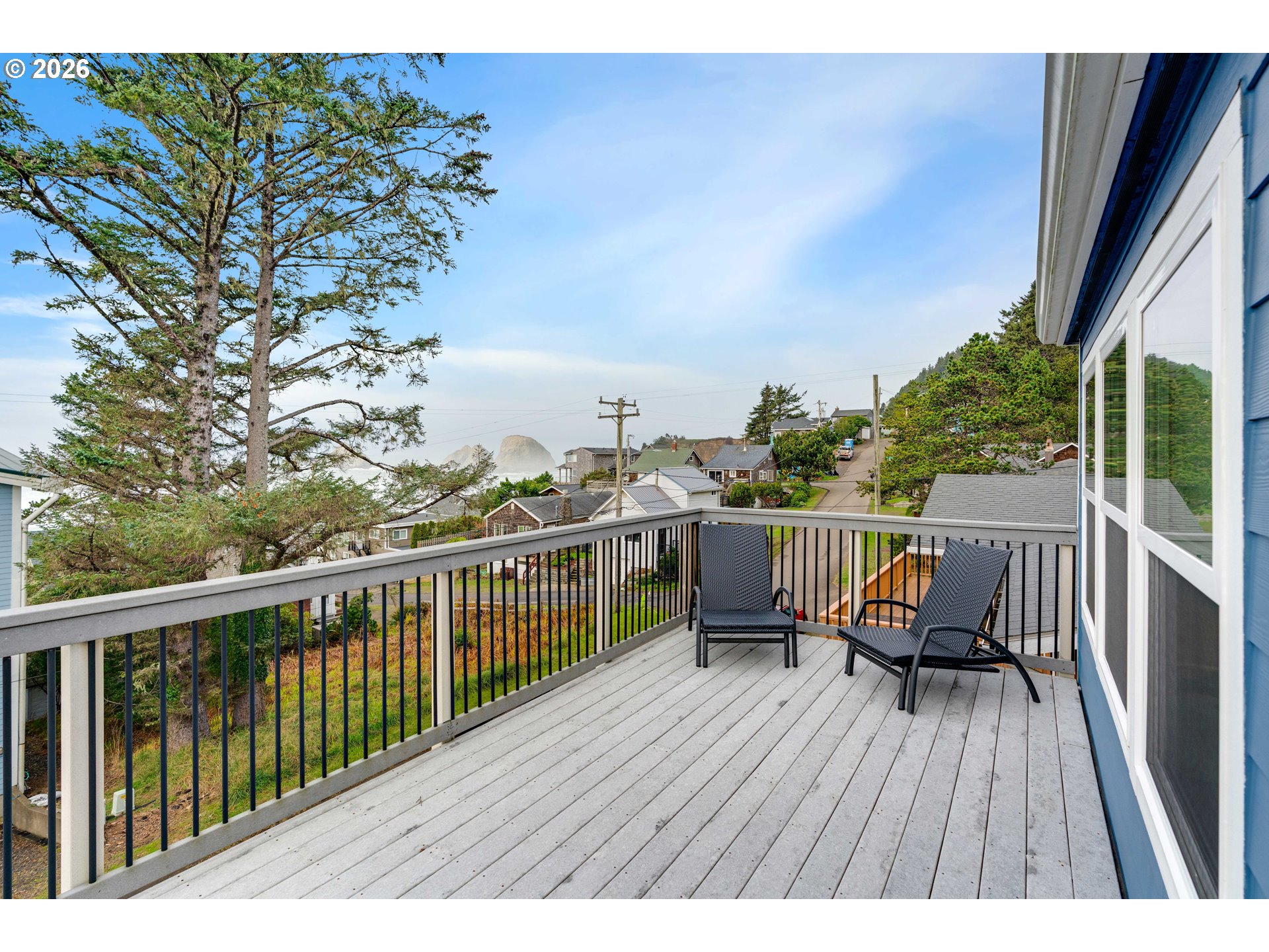 1435 Sunset Avenue Oceanside, OR 97141 - Photo 34 of 46 a view of balcony with deck and wooden floor