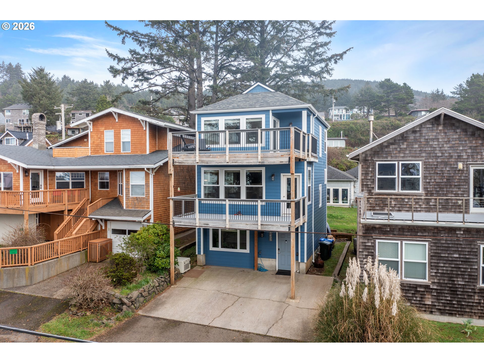 1435 Sunset Avenue Oceanside, OR 97141 - Photo 39 of 46 a front view of a house with a yard