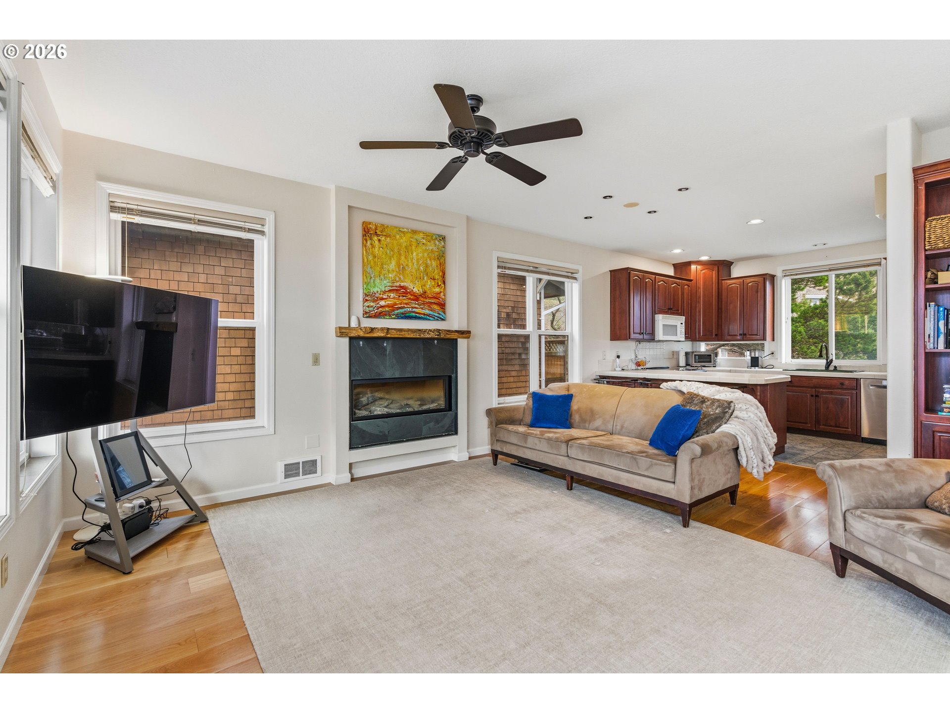 1435 Sunset Avenue Oceanside, OR 97141 - Photo 7 of 46 a living room with furniture and a flat screen tv