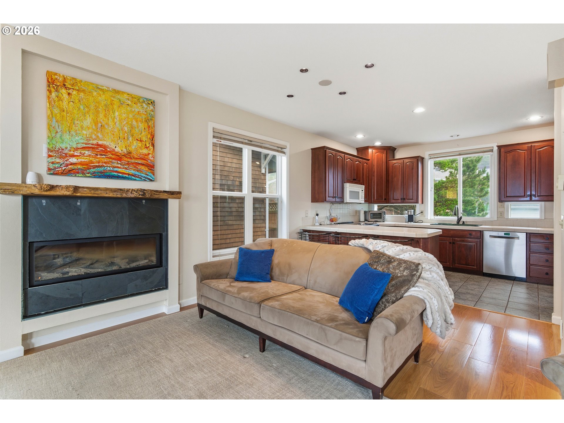 1435 Sunset Avenue Oceanside, OR 97141 - Photo 8 of 46 a living room with furniture and a fireplace