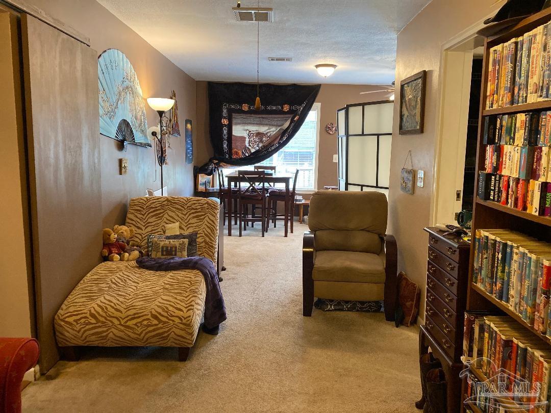 9351 Brunson Road Pensacola, FL 32514 - Photo 10 of 21 Master Bedroom Sitting Area