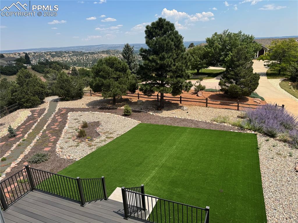 5825 Wilson Road Colorado Springs, CO 80919 - Photo 18 of 48 a view of a backyard with sitting area