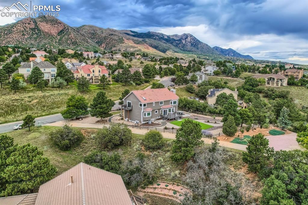 5825 Wilson Road Colorado Springs, CO 80919 - Photo 44 of 48 an aerial view of a house with a yard
