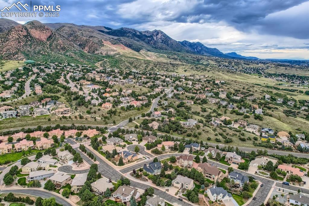 5825 Wilson Road Colorado Springs, CO 80919 - Photo 45 of 48 an aerial view of residential house with yard and mountain view in back