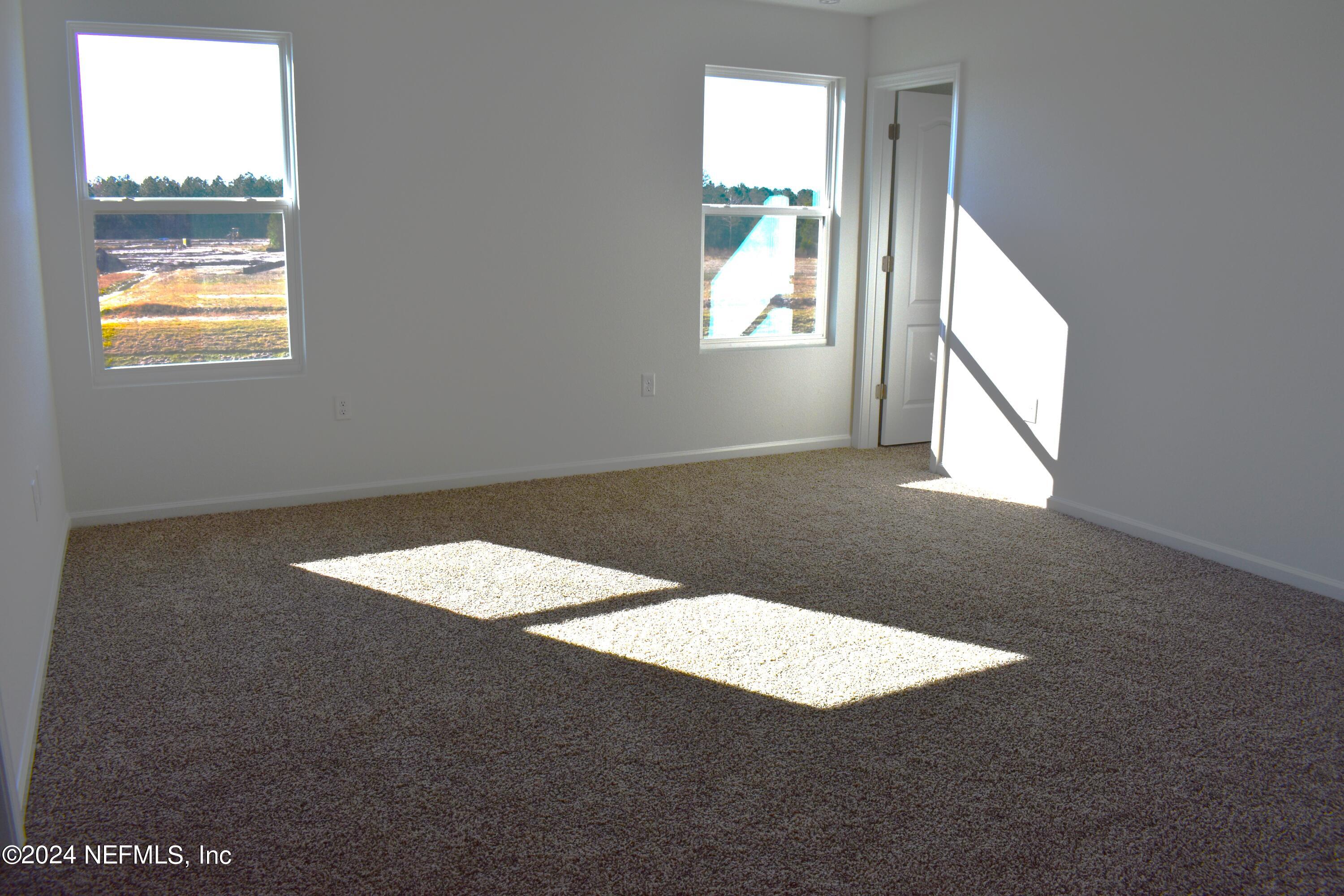 12654 European Beech Road Jacksonville, FL 32218 - Photo 20 of 42 R ARB 5 Master Bedroom