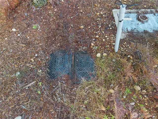 a aerial view of a house with a yard